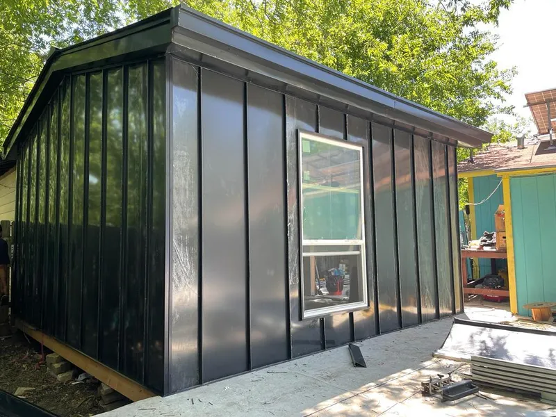 Black standing seam metal wall panels for Roof Inspection in East Hanover